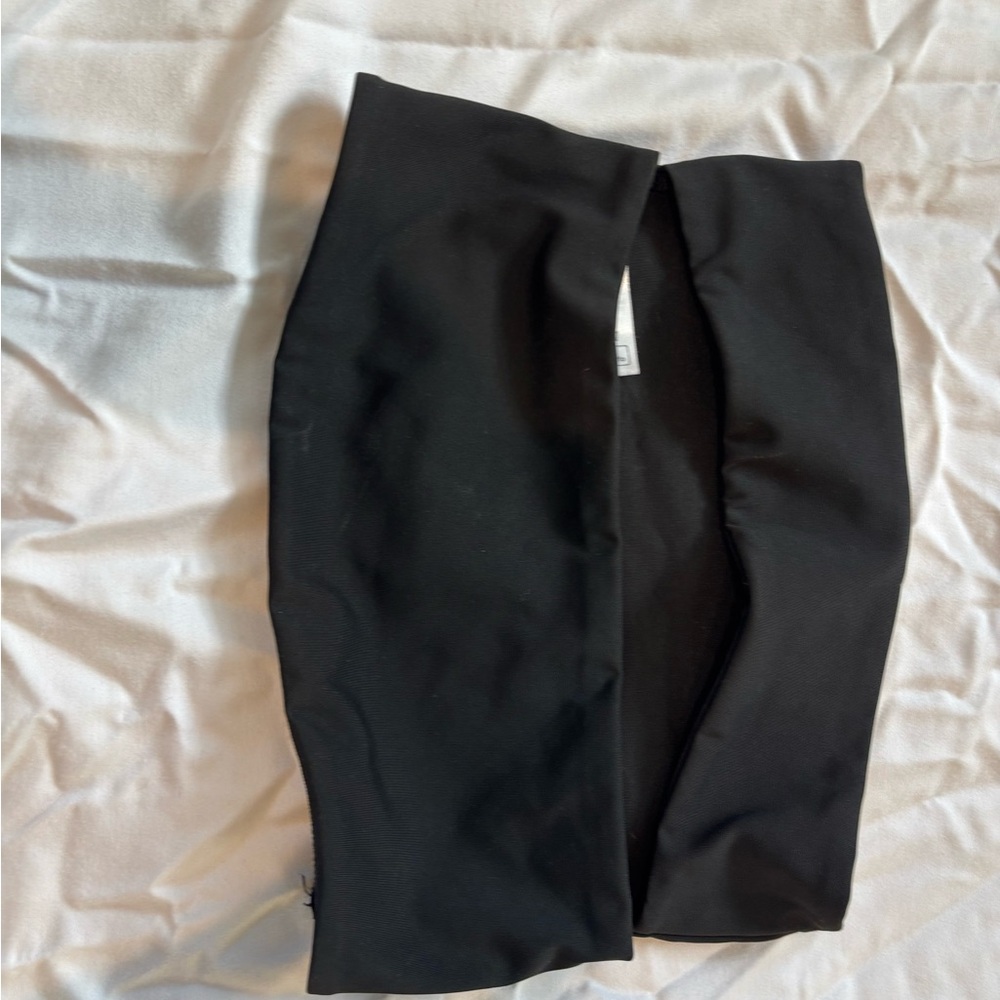 Edikted Darcey cut out black split middle Strapless Top